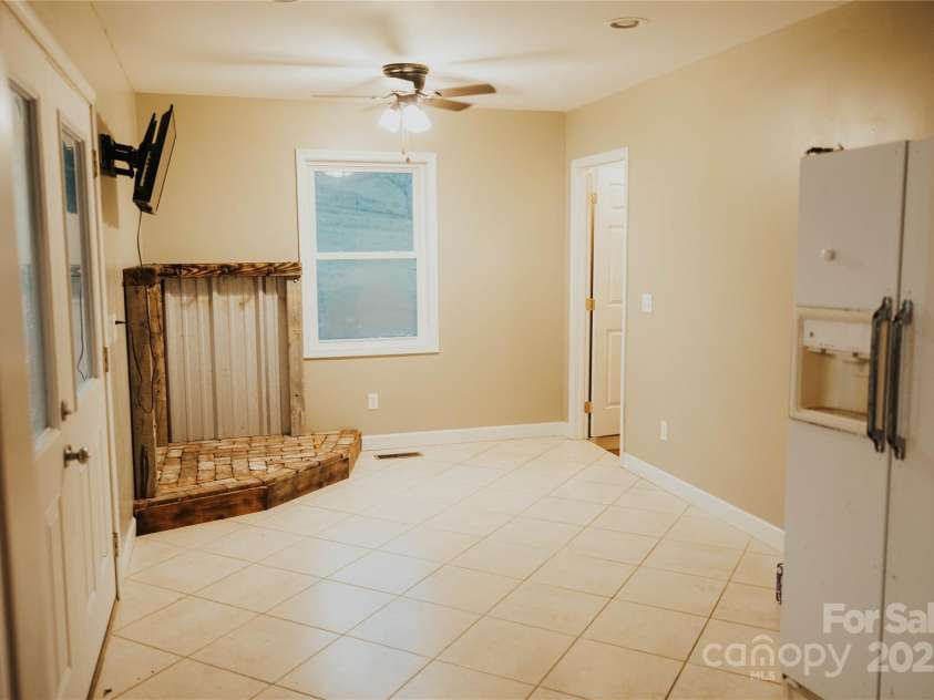 115 Grindstaff Road, Bakersville, NC 28705.  MLS# CAR4199557, YatesRealty ID 8377. Den/ entry mud room