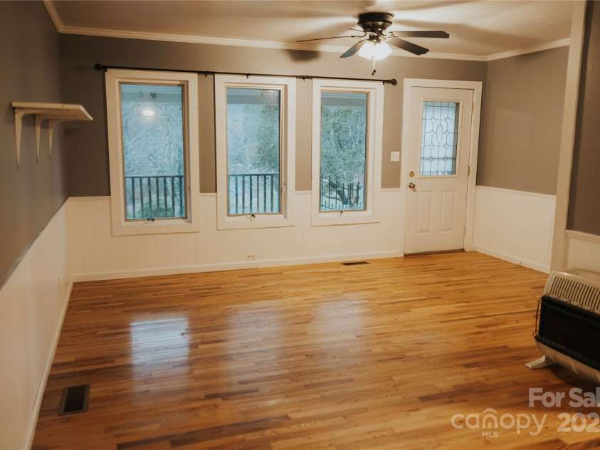 115 Grindstaff Road, Bakersville, NC 28705.  MLS# CAR4199557, YatesRealty ID 8377. Living Room
