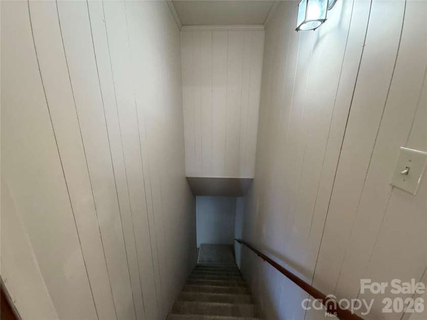 424 Holland Drive, Statesville, NC 28677.  MLS# CAR4335515, YatesRealty ID 838. Stairs to basement