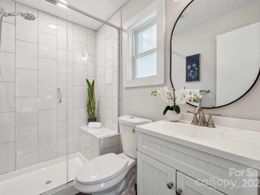 3725 Dunwoody Drive, Charlotte, NC 28215.  MLS# CAR4245588, YatesRealty ID 8389. Beautiful, bright primary bathroom