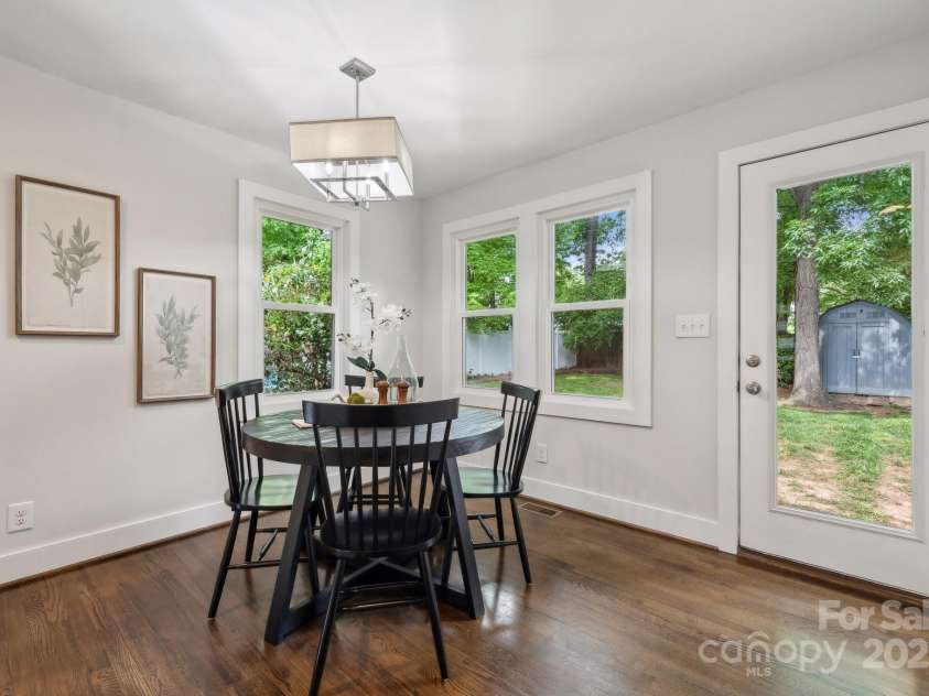 3725 Dunwoody Drive, Charlotte, NC 28215.  MLS# CAR4245588, YatesRealty ID 8389. Eat-in dining area surrounded by windows flows perfectly to the back yard