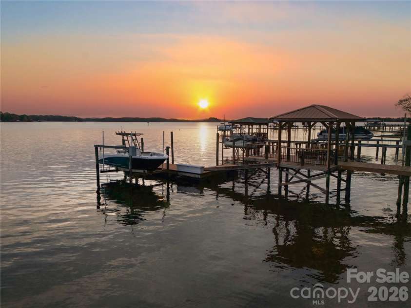 18019 Whispering Oaks Drive, Cornelius, NC 28031.  MLS# CAR4355958, YatesRealty ID 8397. Enjoy Amazing Sunsets Everyday from your Private Dock