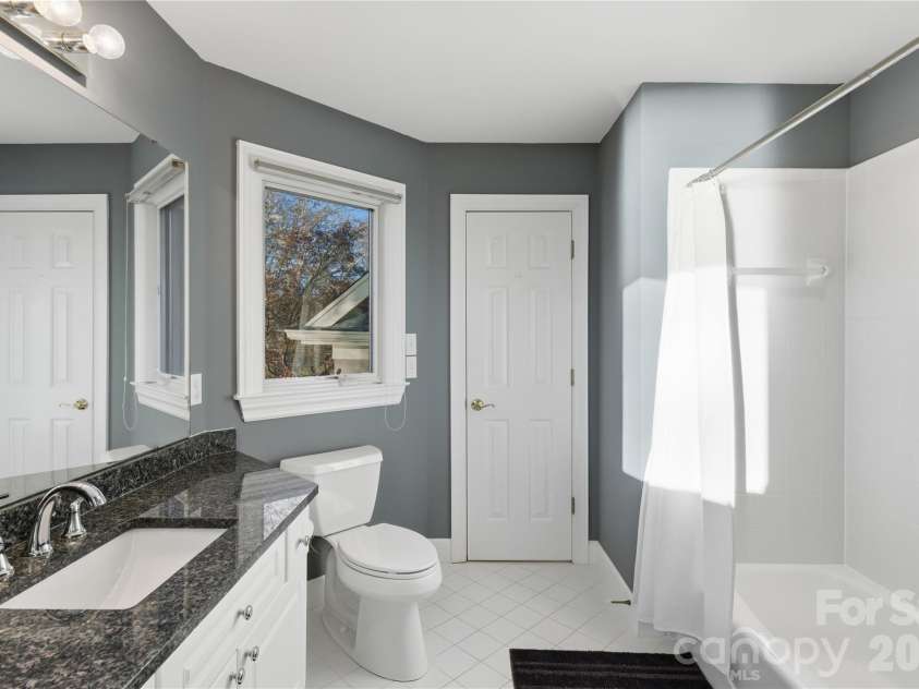 18019 Whispering Oaks Drive, Cornelius, NC 28031.  MLS# CAR4355958, YatesRealty ID 8397. Hall Bathroom