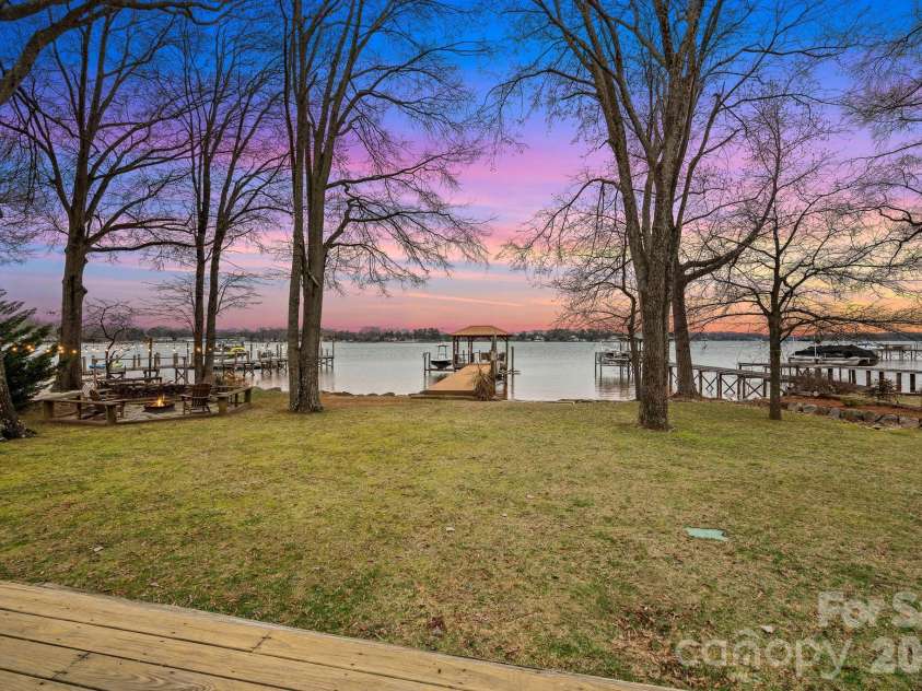 18019 Whispering Oaks Drive, Cornelius, NC 28031.  MLS# CAR4355958, YatesRealty ID 8397. Large Level Backyard