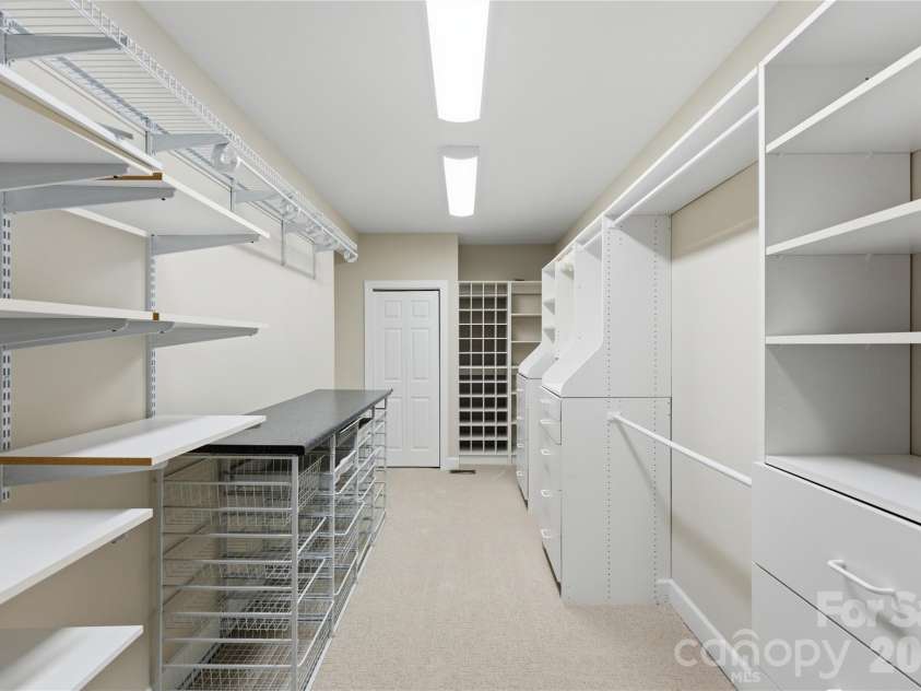 18019 Whispering Oaks Drive, Cornelius, NC 28031.  MLS# CAR4355958, YatesRealty ID 8397. Oversized Custom Closet