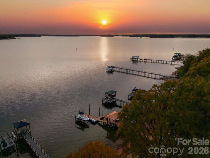18019 Whispering Oaks Drive, Cornelius, NC 28031.  MLS# CAR4355958, YatesRealty ID 8397. Picturesque Sunset Views 
