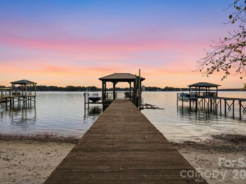 18019 Whispering Oaks Drive, Cornelius, NC 28031.  MLS# CAR4355958, YatesRealty ID 8397. Sandy Beach with Lake Fed Irrigation