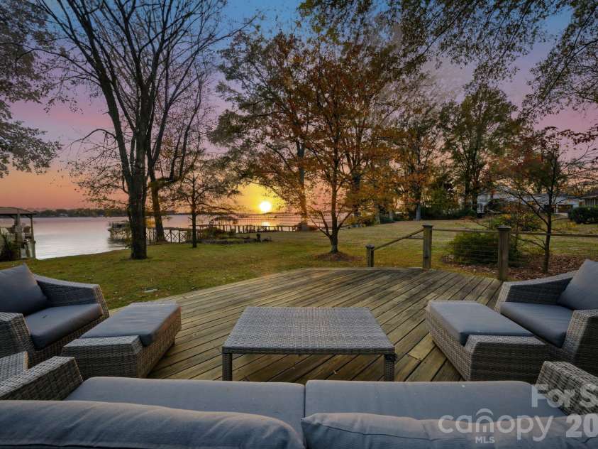 18019 Whispering Oaks Drive, Cornelius, NC 28031.  MLS# CAR4355958, YatesRealty ID 8397. Sunset View from Oversized Back Porch