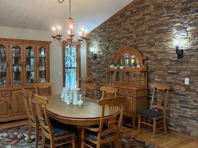 23 Dvga Court, Brevard, NC 28712.  MLS# CAR4285839, YatesRealty ID 8398. Dining area with accent wall
