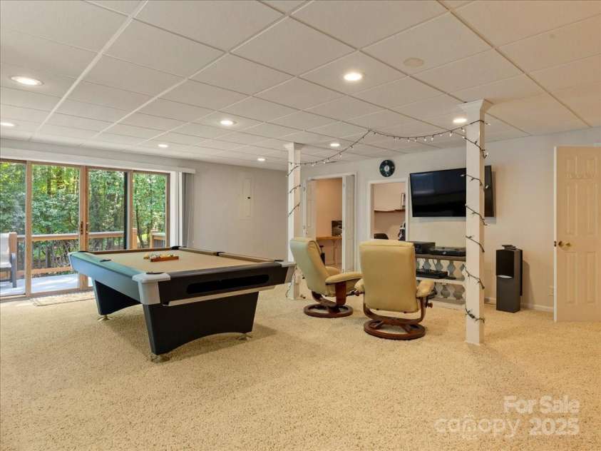 23 Dvga Court, Brevard, NC 28712.  MLS# CAR4285839, YatesRealty ID 8398. Light and Open Game Room