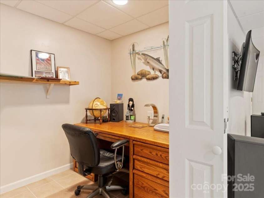 23 Dvga Court, Brevard, NC 28712.  MLS# CAR4285839, YatesRealty ID 8398. Lower level Office