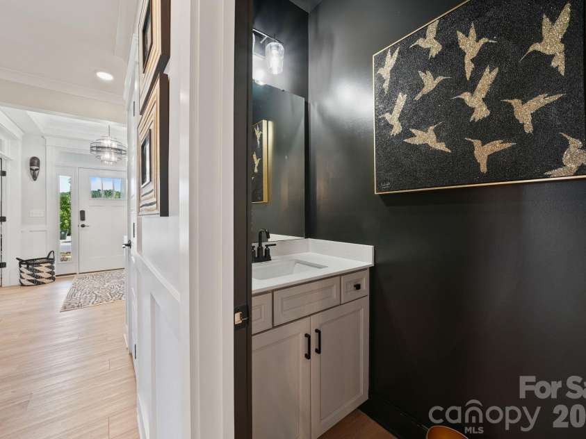 13231 Fiore Place, Huntersville, NC 28078.  MLS# CAR4394253, YatesRealty ID 8399. Main level half bath