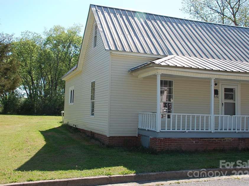 710 Austin Street, Albemarle, NC 28001.  MLS# CAR4131913, YatesRealty ID 84. Side yard view