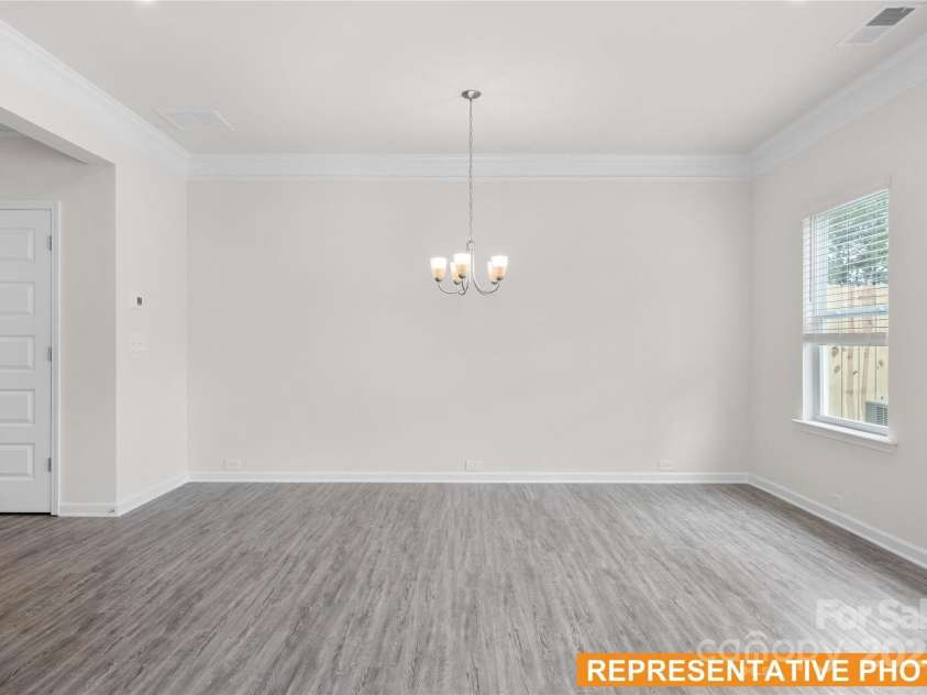 6013 Jasmine Branch Road, Charlotte, NC 28216.  MLS# CAR4266477, YatesRealty ID 8401. Suwanee Dining Room