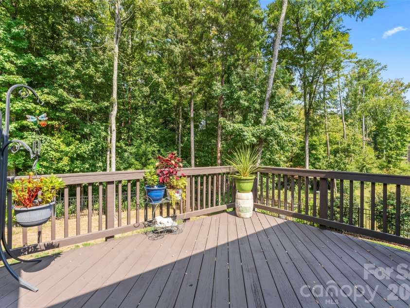 8015 Frances Haven Drive, Harrisburg, NC 28075.  MLS# CAR4318359, YatesRealty ID 8404. Newly Painted Deck