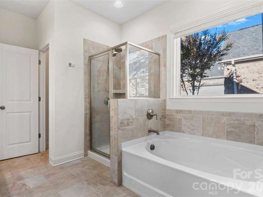 8015 Frances Haven Drive, Harrisburg, NC 28075.  MLS# CAR4318359, YatesRealty ID 8404. Primary Bathroom