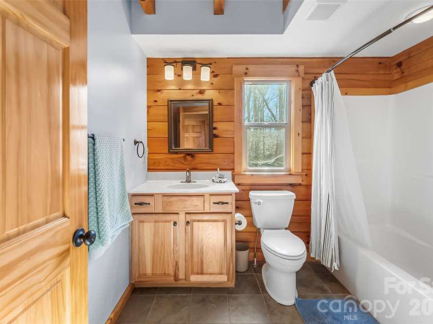 204 Mountain Vista Drive, Nebo, NC 28761.  MLS# CAR4330254, YatesRealty ID 8408. Main level full bath