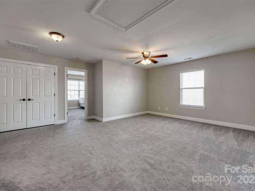 10071 Highland Creek Circle, Indian Land, SC 29707.  MLS# CAR4235607, YatesRealty ID 8409. Huge Loft Area-top of stairs