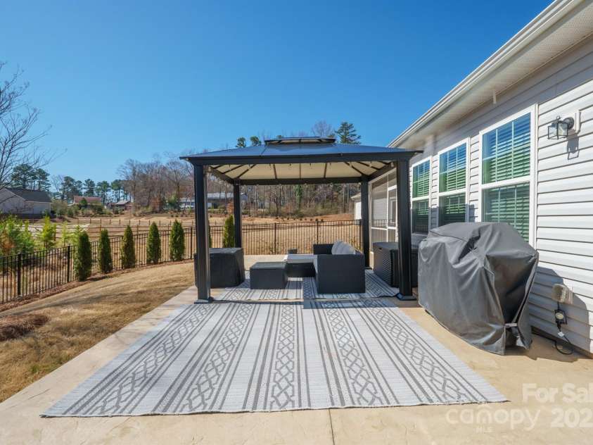 168 Kennerly Center Drive, Mooresville, NC 28115.  MLS# CAR4234236, YatesRealty ID 8416. Huge patio and gazebo