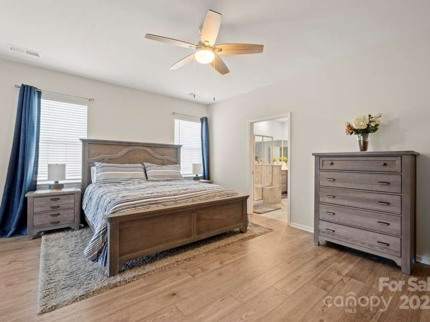 168 Kennerly Center Drive, Mooresville, NC 28115.  MLS# CAR4234236, YatesRealty ID 8416. Main floor Primary Bedroom