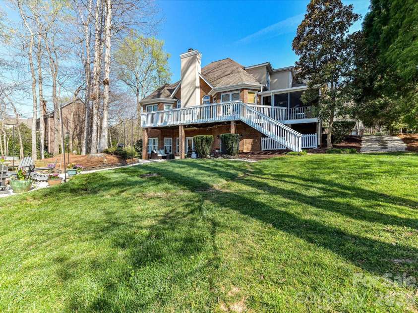 1320 Hudson Place, Davidson, NC 28036.  MLS# CAR4360257, YatesRealty ID 8419. Back of the house