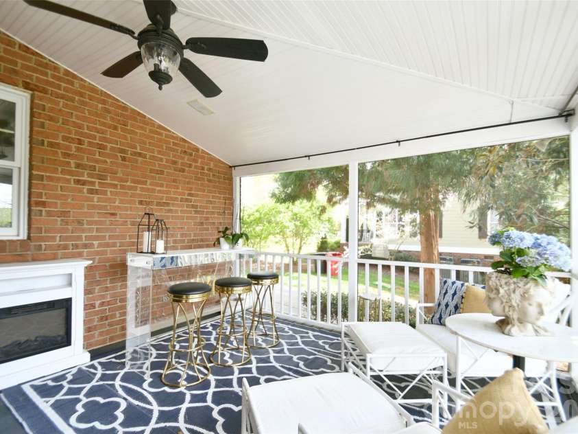 1320 Hudson Place, Davidson, NC 28036.  MLS# CAR4360257, YatesRealty ID 8419. Beautiful screened porch is perfect for entertaining