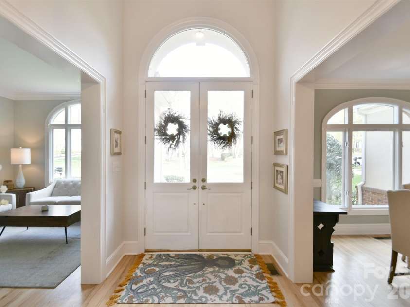 1320 Hudson Place, Davidson, NC 28036.  MLS# CAR4360257, YatesRealty ID 8419. Enter to a light-filled two-story foyer