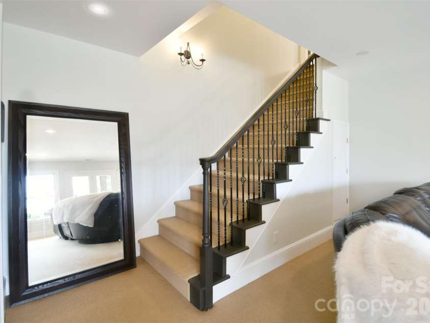 1320 Hudson Place, Davidson, NC 28036.  MLS# CAR4360257, YatesRealty ID 8419. Stairs leading to the basement