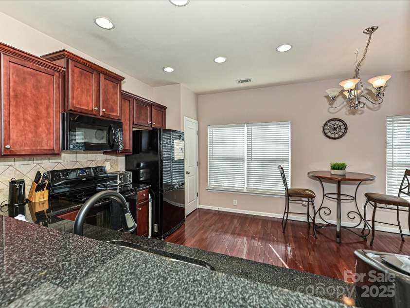 14121 Winford Lane, Charlotte, NC 28262.  MLS# CAR4195497, YatesRealty ID 8428. Kitchen & Dining