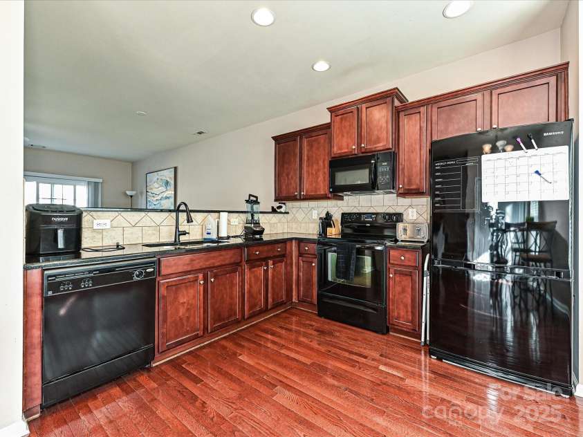 14121 Winford Lane, Charlotte, NC 28262.  MLS# CAR4195497, YatesRealty ID 8428. Kitchen & Dining