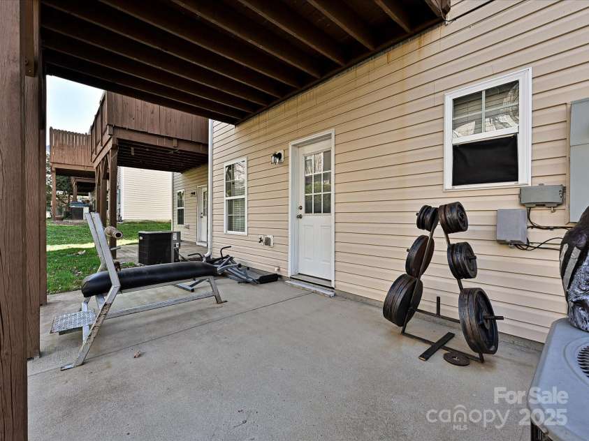 14121 Winford Lane, Charlotte, NC 28262.  MLS# CAR4195497, YatesRealty ID 8428. Patio