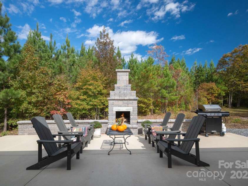 1260 Beaver Island Trail Road, Walnut Cove, NC 27052.  MLS# CAR4325171, YatesRealty ID 843. Concrete block fireplace w/ built-in bench wall