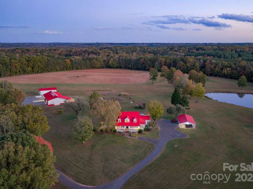 1260 Beaver Island Trail Road, Walnut Cove, NC 27052.  MLS# CAR4325171, YatesRealty ID 843. Custom built farm house w/ extensive Renovations (2020-2021) on 92 acres of private land