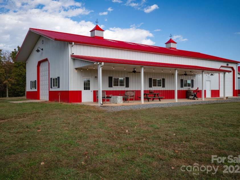 1260 Beaver Island Trail Road, Walnut Cove, NC 27052.  MLS# CAR4325171, YatesRealty ID 843. Equipment building w/ covered porches, electricity/water, and outdoor lighting