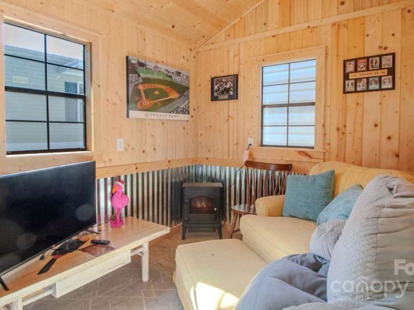 131 Pike Point, Waynesville, NC 28785.  MLS# CAR4224407, YatesRealty ID 8431. Inside Shed