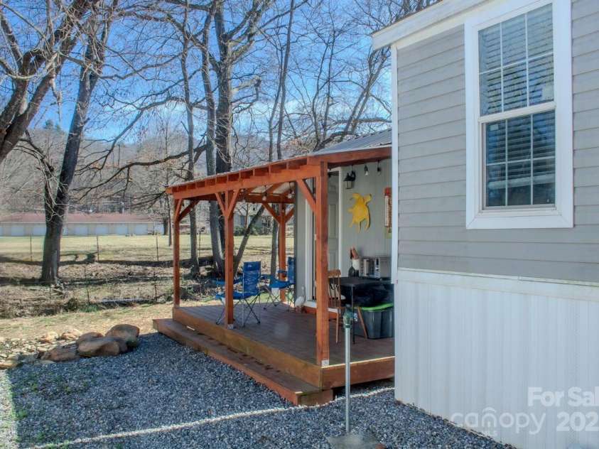 131 Pike Point, Waynesville, NC 28785.  MLS# CAR4224407, YatesRealty ID 8431. Outside looking toward rear of property