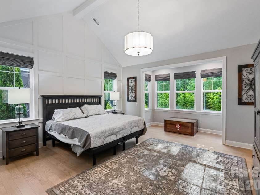 13212 Oak Farm Lane, Huntersville, NC 28078.  MLS# CAR4392191, YatesRealty ID 8431. Cathedral ceilings and expansive windows create an airy, light-filled space that feels both luxurious and inviting.