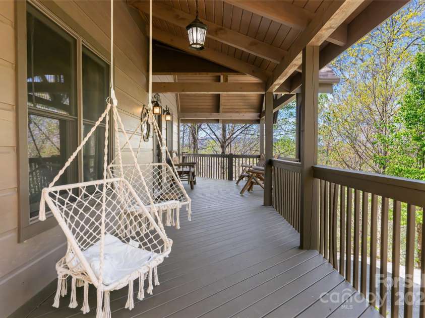 837 Peregrine Drive, Hendersonville, NC 28739.  MLS# CAR4250504, YatesRealty ID 8432. Front porch