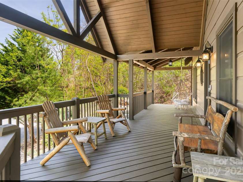 837 Peregrine Drive, Hendersonville, NC 28739.  MLS# CAR4250504, YatesRealty ID 8432. Front porch