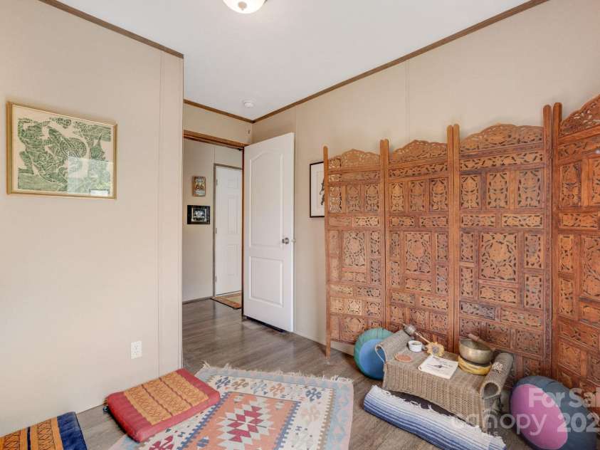 4825 Cane Creek Road, Bakersville, NC 28705.  MLS# CAR4248421, YatesRealty ID 8433. Bedroom 2 or office