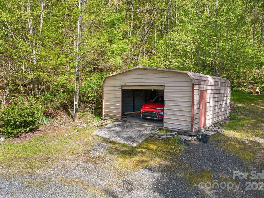 4825 Cane Creek Road, Bakersville, NC 28705.  MLS# CAR4248421, YatesRealty ID 8433. Detached 546 sf garage/workshop