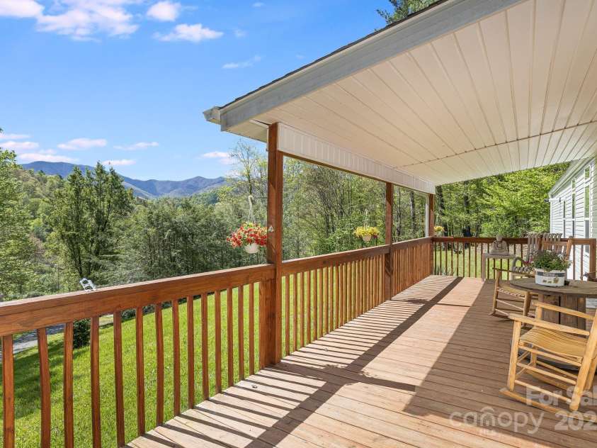 4825 Cane Creek Road, Bakersville, NC 28705.  MLS# CAR4248421, YatesRealty ID 8433. Long range views from porch!