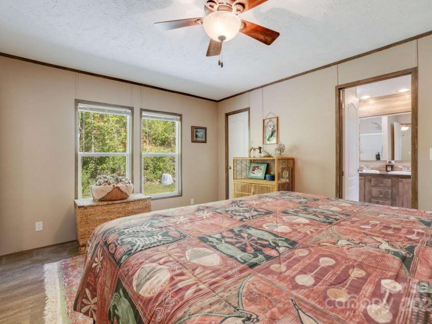 4825 Cane Creek Road, Bakersville, NC 28705.  MLS# CAR4248421, YatesRealty ID 8433. Primary bedroom