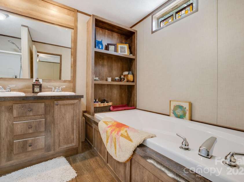 4825 Cane Creek Road, Bakersville, NC 28705.  MLS# CAR4248421, YatesRealty ID 8433. Primary ensuite