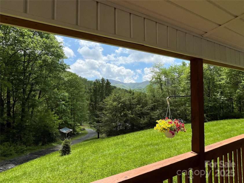 4825 Cane Creek Road, Bakersville, NC 28705.  MLS# CAR4248421, YatesRealty ID 8433. View from front porch