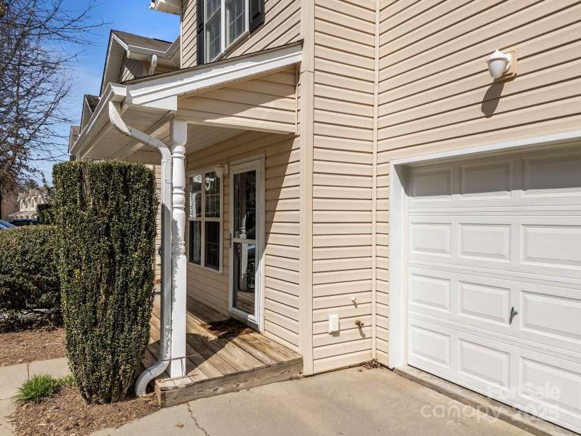 107 Alpine Ridge Drive, Asheville, NC 28803.  MLS# CAR4241586, YatesRealty ID 8436. Covered Front Porch & garage!