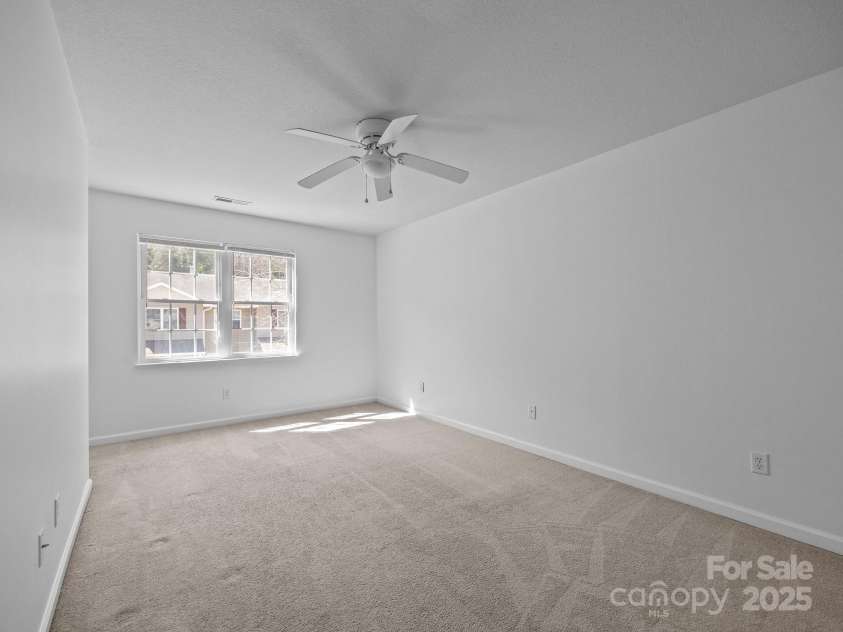 107 Alpine Ridge Drive, Asheville, NC 28803.  MLS# CAR4241586, YatesRealty ID 8436. Impressively sized third bedroom