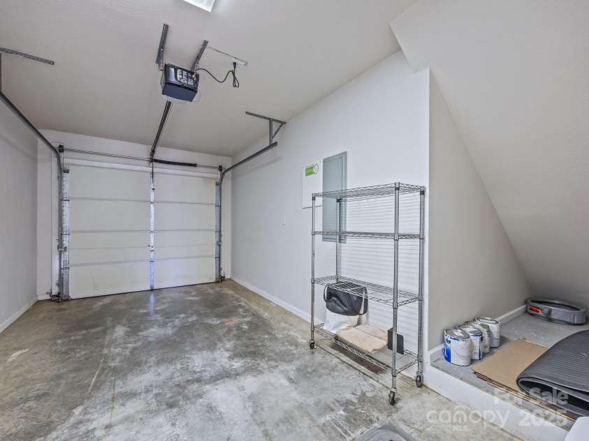 107 Alpine Ridge Drive, Asheville, NC 28803.  MLS# CAR4241586, YatesRealty ID 8436. One car garage with storage