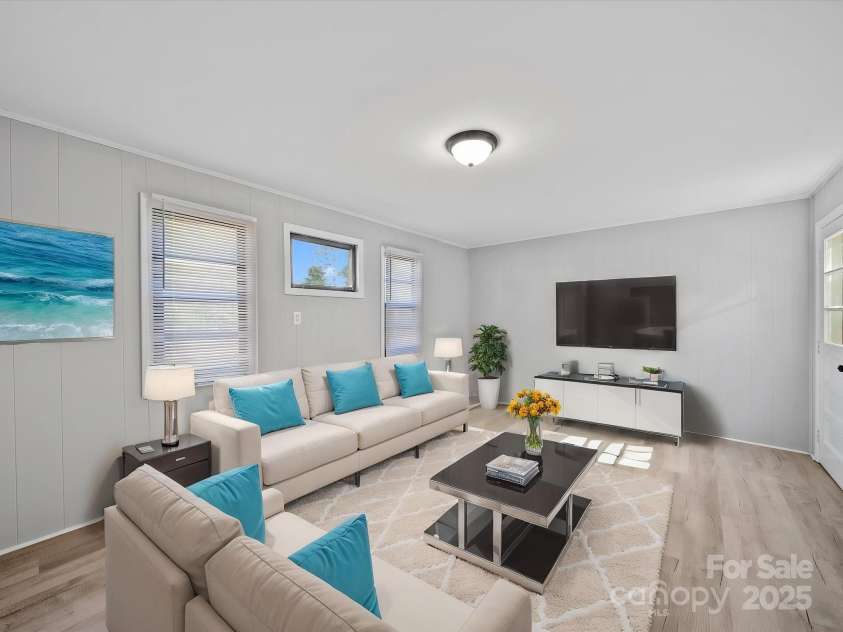 1142 Mona Drive, Charlotte, NC 28206.  MLS# CAR4247504, YatesRealty ID 8437. Living Room - Virtually Staged