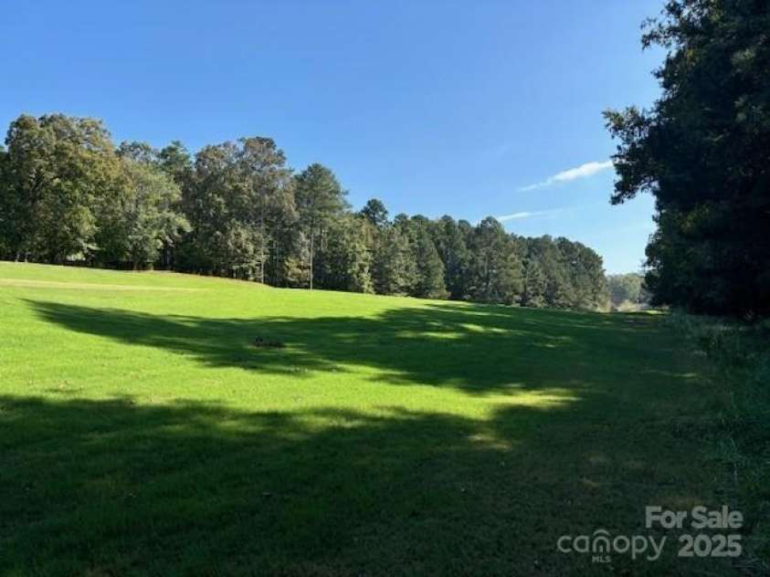 304 Tradition Drive, Mount Gilead, NC 27306.  MLS# CAR4217208, YatesRealty ID 8439. Rear facing course